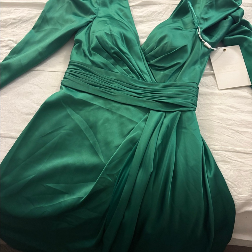 Mac Duggal beautiful dress with a slit and a train looks really nice on